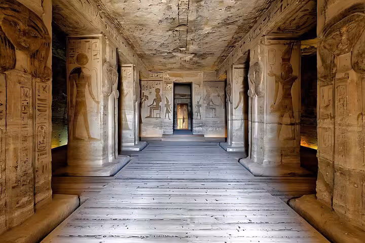 Dendera Temple interior corridor with carved columns and hieroglyphs on full-day tour from Hurghada