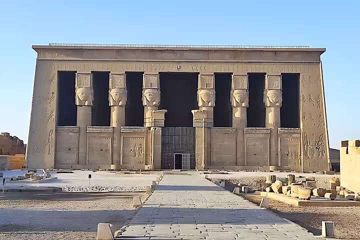 Front view of Dendera Temple of Hathor with monumental columns, visited on Dendera Abydos tour from Hurghada
