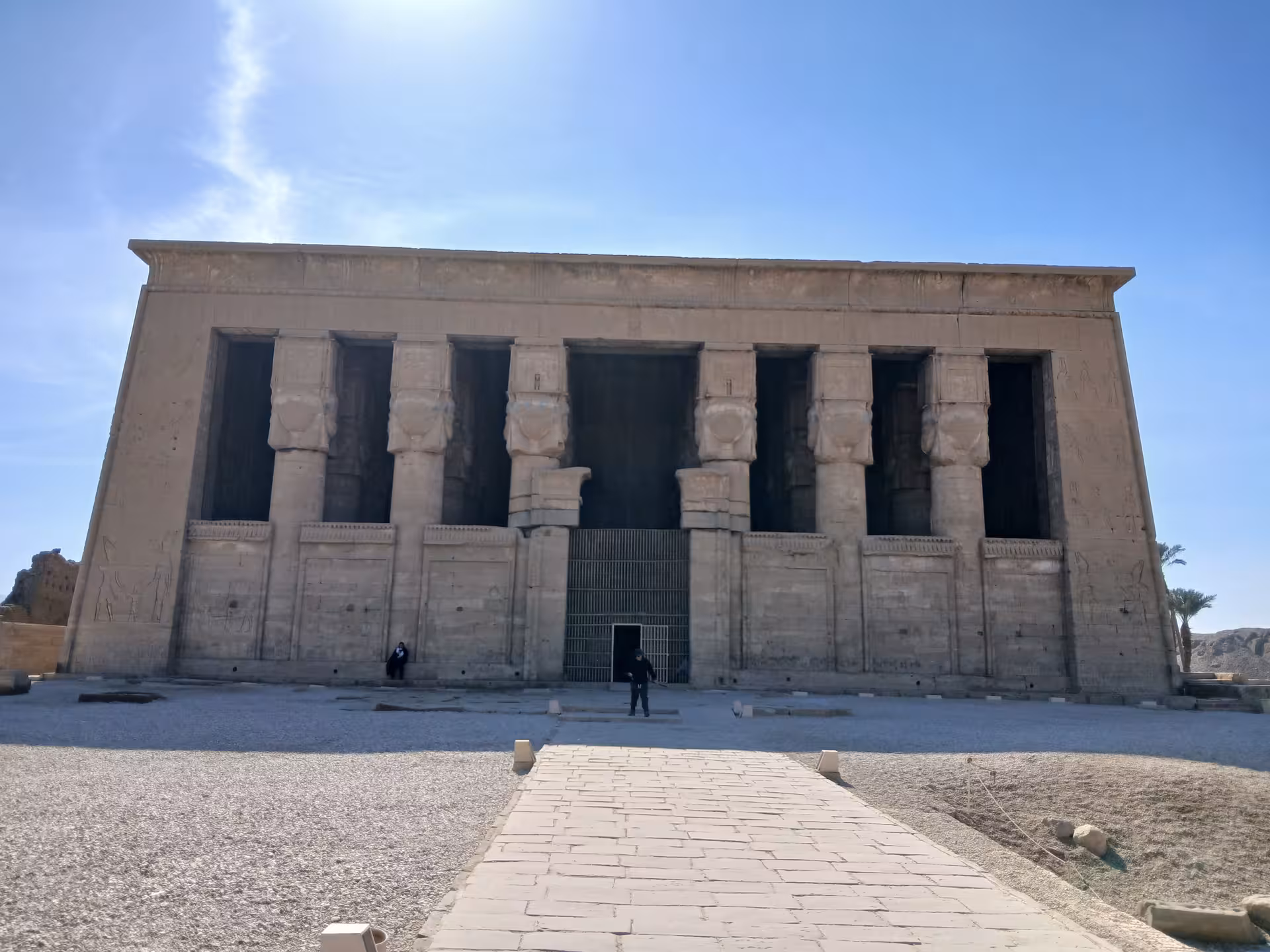 Majestic facade of Dendera Temple under a bright sky, highlighting ancient Egyptian architecture near Luxor.
