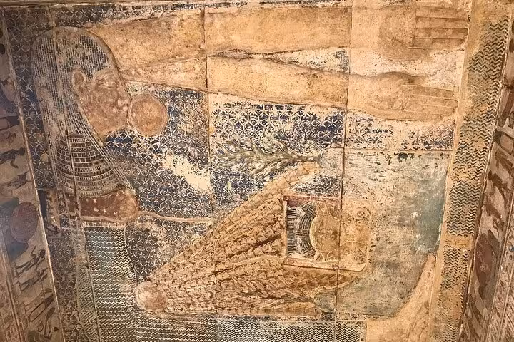 Intricate ancient Egyptian relief depicting Nut on the ceiling of Dendera Temple, showcasing mythological artistry.