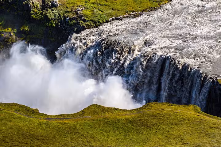 Powerful Dettifoss waterfall cascading in Iceland, a highlight on the 4x4 Diamond Circle Day Tour from Lake Myvatn.
