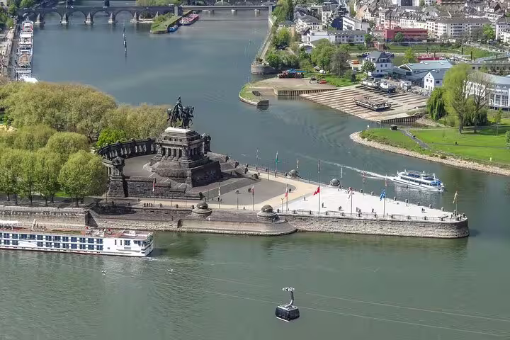 Aerial view of Deutsches Eck in Koblenz where Rhine meets Moselle, key stop on the e-scavenger hunt