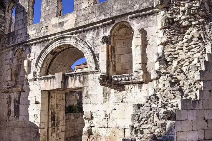 Ancient stone arch inside Diocletian’s Palace, Split shore excursion from cruise ship to Trogir
