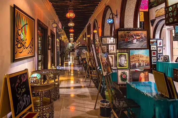 Discover art and culture in a beautifully lit gallery in Doha's Souq Waqif on a private night tour.