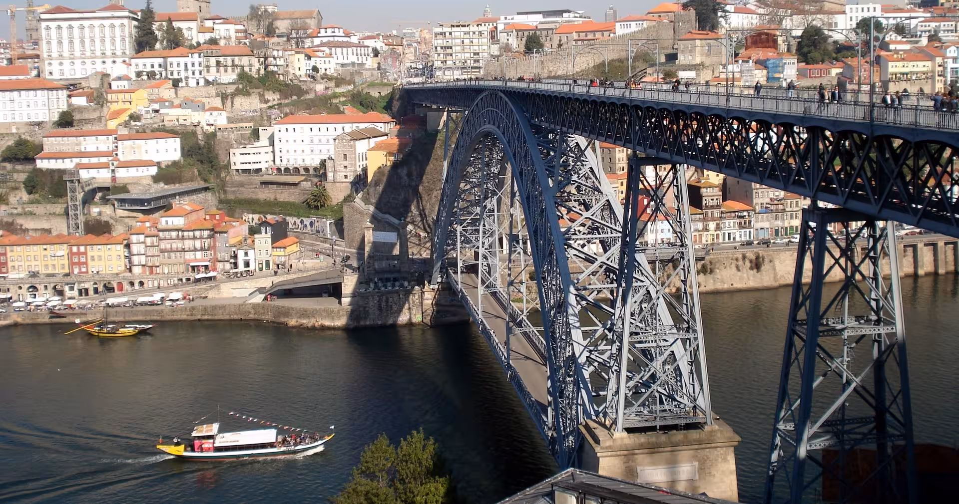Dom Luís I Bridge arch over the Douro River, a highlight on a Porto half-day small-group walking tour