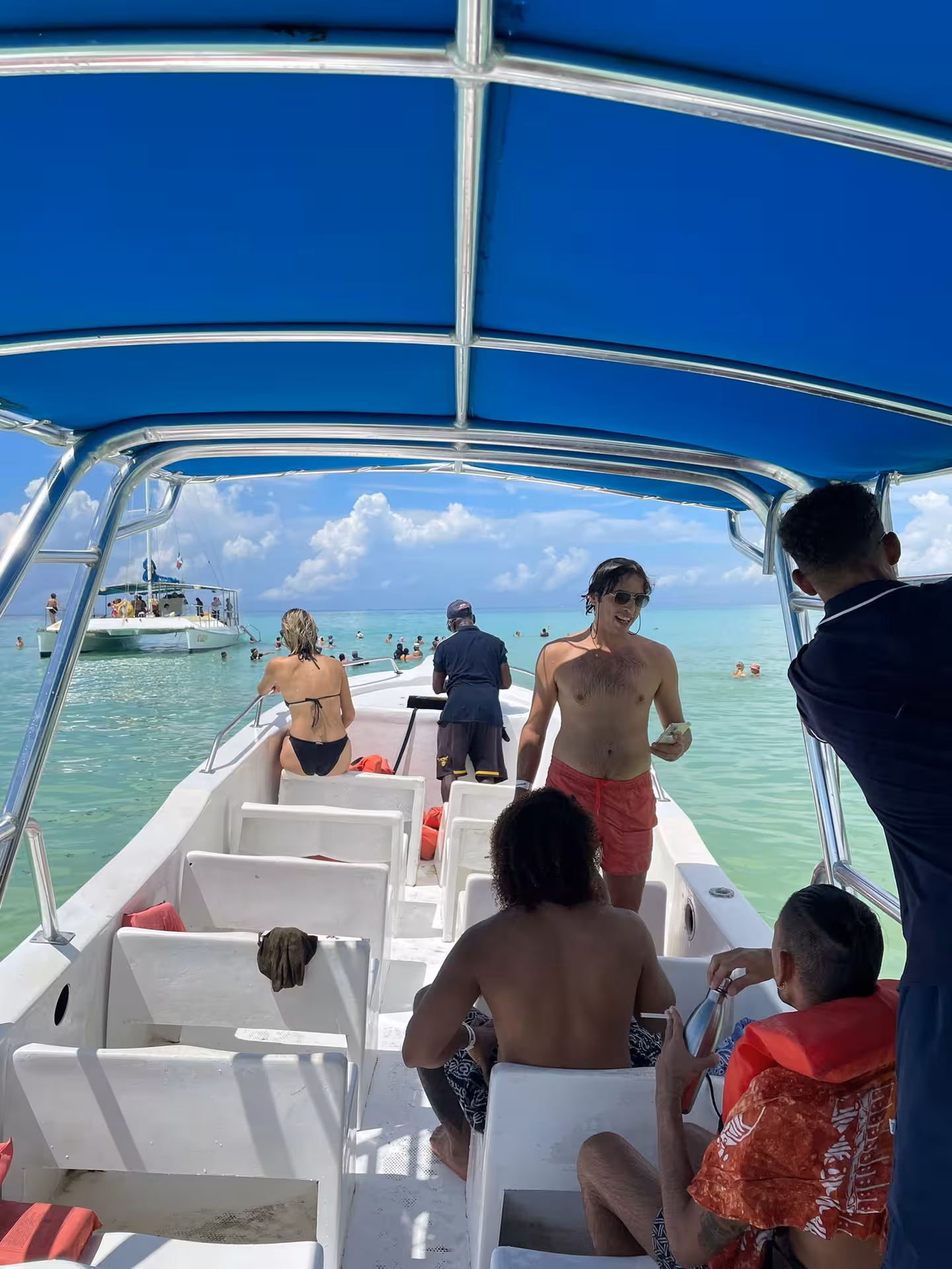 Small boat excursion on crystal-clear Dominican Republic waters, island-hopping and snorkeling on a 7-day experience tour
