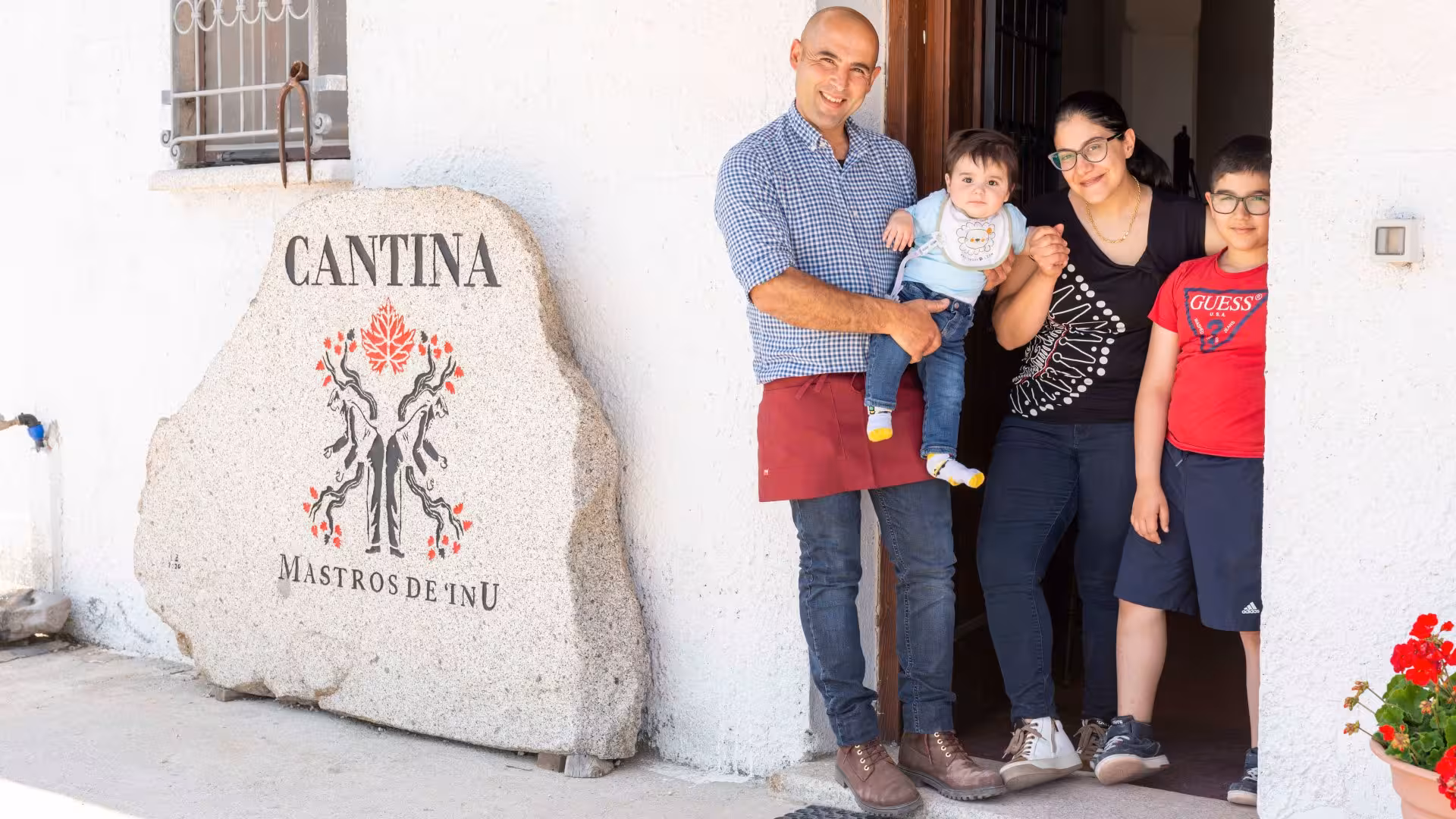 Family welcomes visitors at Cantina Mastros de Inu in Dorgali, offering an authentic winery experience.