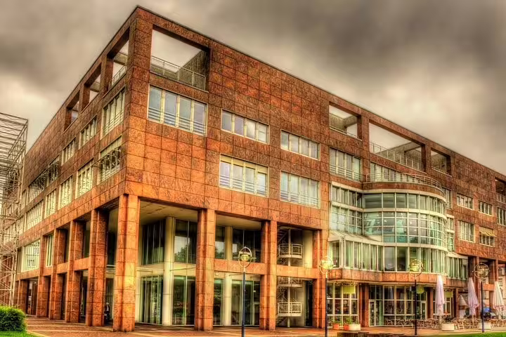 Modern Dortmund architecture with glass atrium, featured waypoint on a self-guided scavenger hunt walking tour
