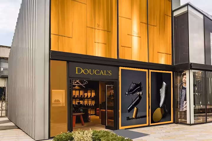 Doucal's store entrance at The Mall, showcasing premium footwear in a stylish setting near Rome.