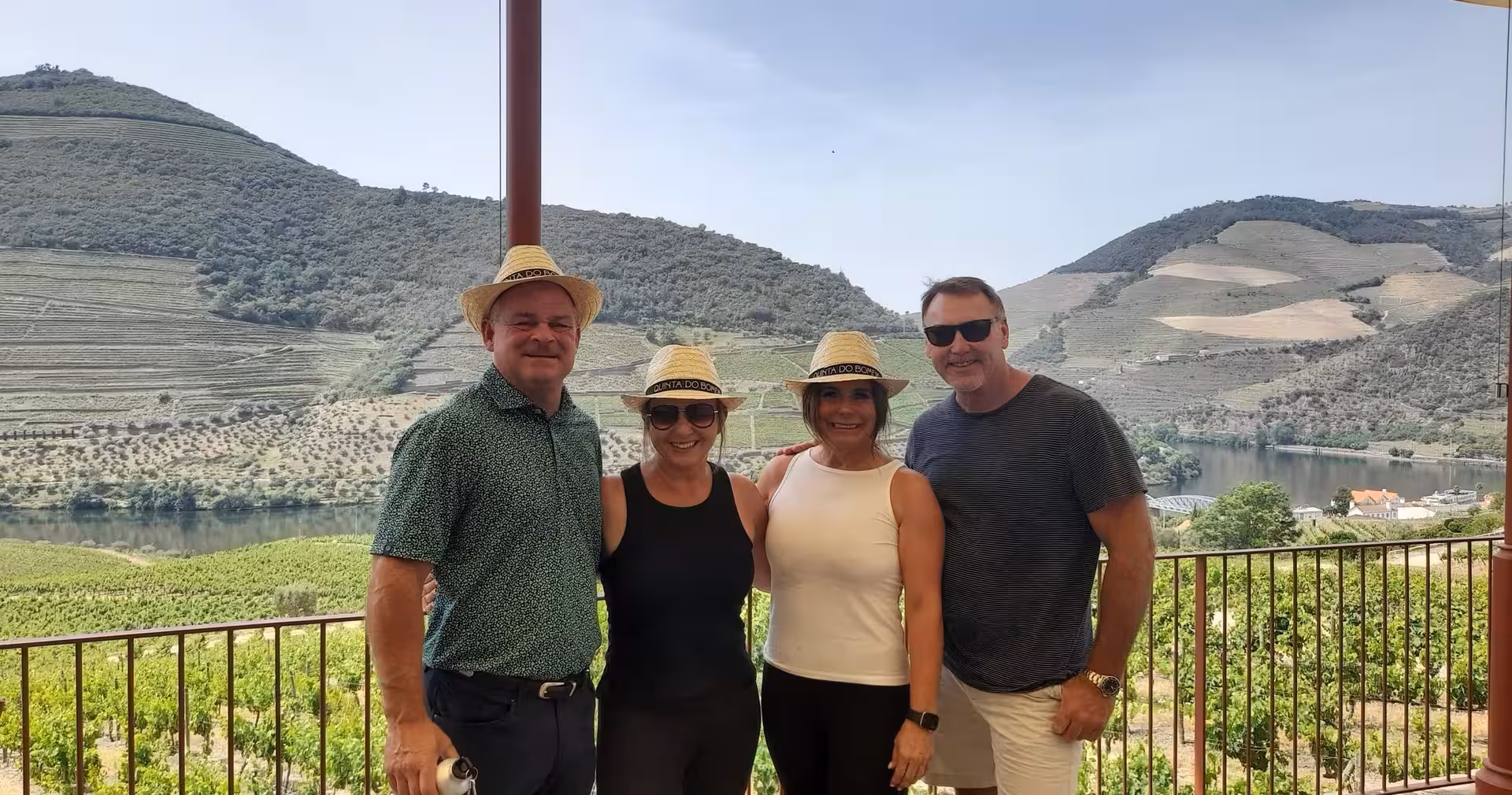 Small-group Douro Valley hike from Braga with vineyard viewpoint photo at a winery terrace over the river