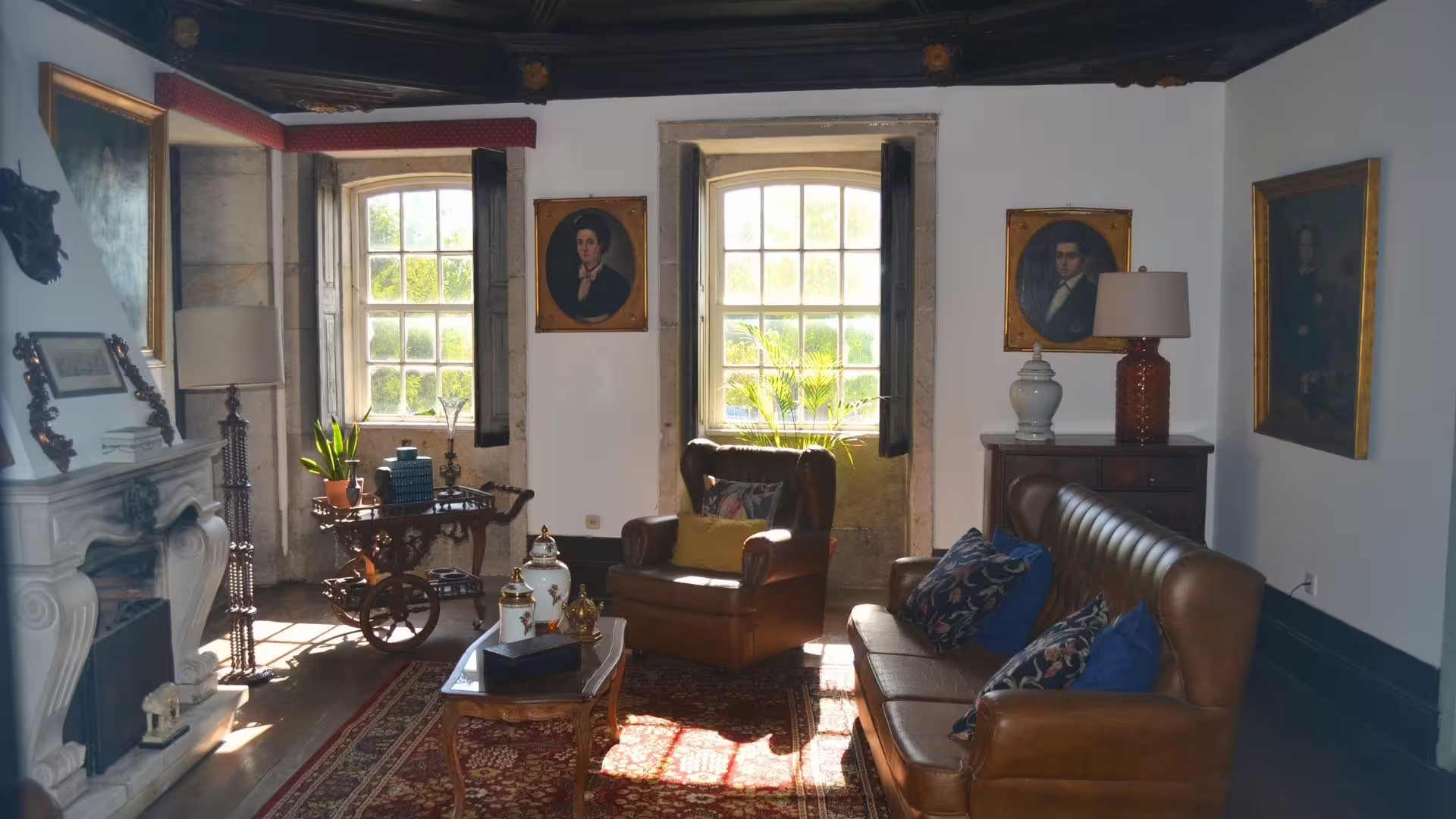 Image of chairs and paintings from a Douro house living room