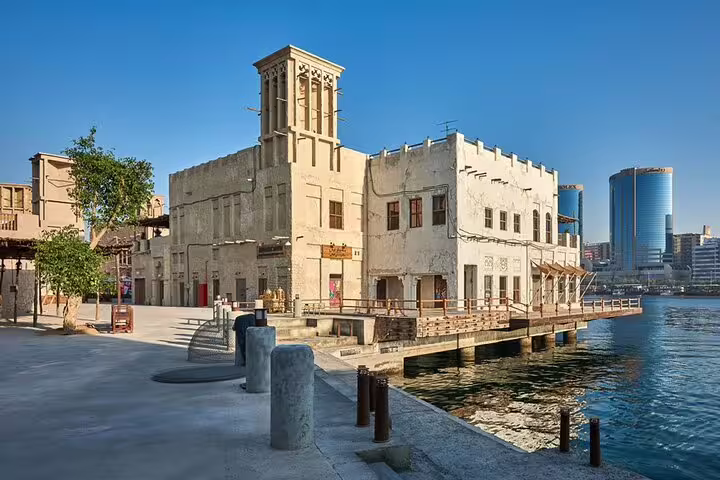 Explore Dubai's Al Fahidi Historical District with authentic architecture and waterfront views on a private full-day tour.