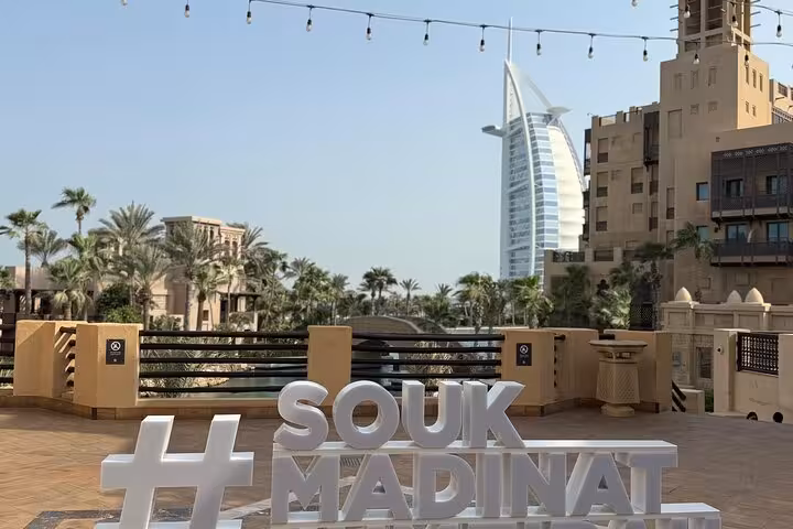 Souk Madinat Jumeirah viewpoint with Burj Al Arab, part of Dubai city tour with Ain Dubai entrance