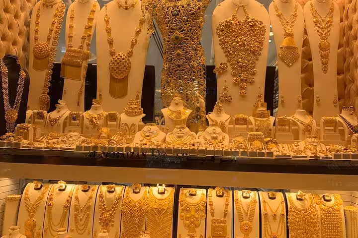Dubai Gold Souk jewelry display in Old Town, a highlight on private half-day Dubai city tour