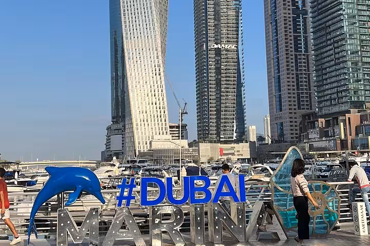 Dubai Marina skyline and #Dubai Marina sign on private Dubai tour with Burj Khalifa ticket and hotel pickup