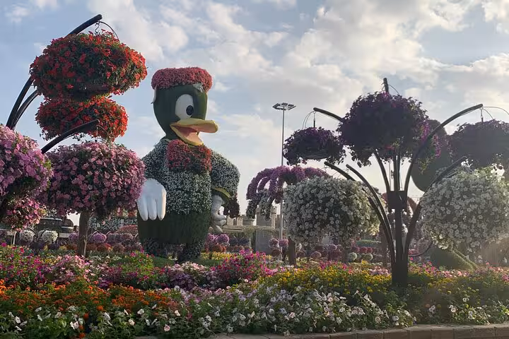 Dubai Miracle Garden floral duck topiary and hanging baskets on private tour with hotel pick up