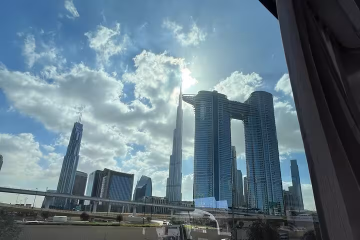 Dubai skyline with Burj Khalifa and Downtown towers on private Abu Dhabi to Dubai city tour with fountains show
