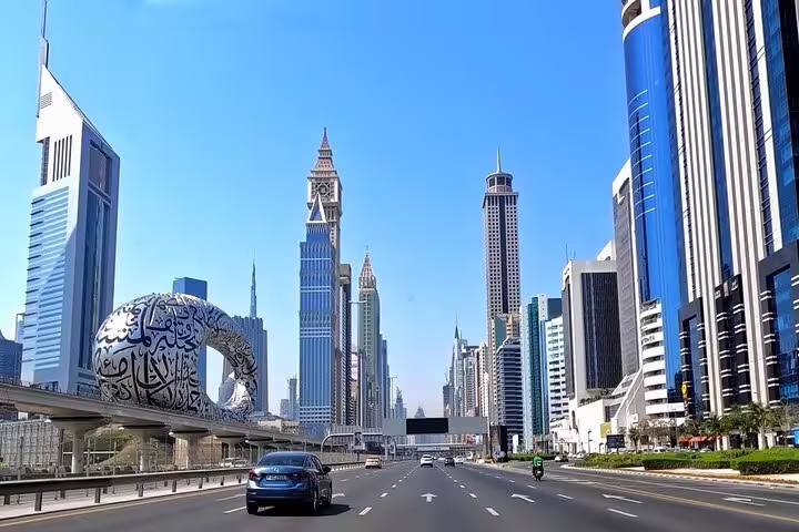 Dubai skyline featuring modern skyscrapers and the iconic Museum of the Future, seen during a private city tour.