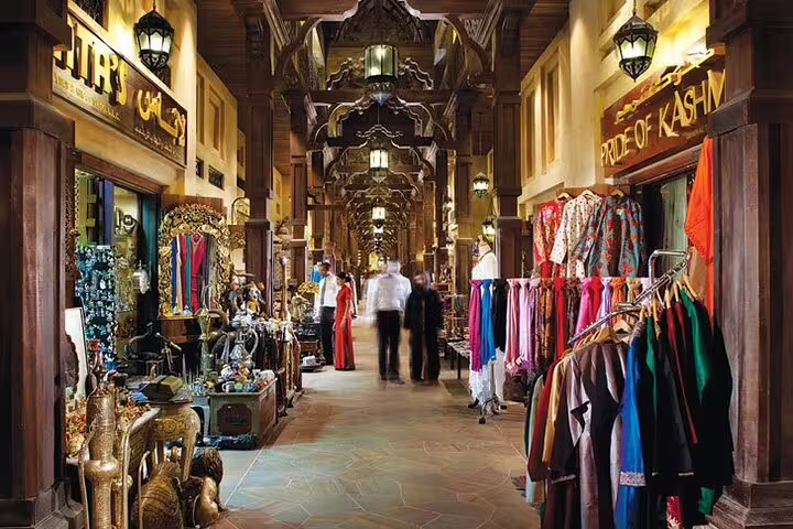 Explore vibrant textiles and treasures in Dubai's traditional souk on a 4x4 private city sightseeing tour.