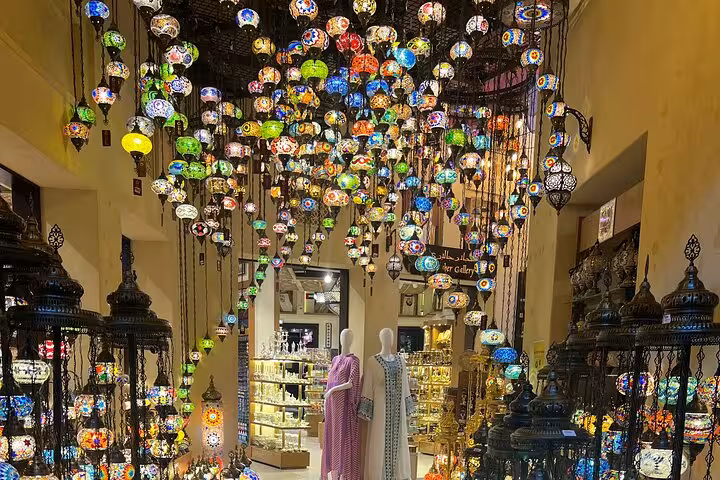 Colorful lanterns in Dubai souk market shop, a highlight on Dubai city tour with Ain Dubai entrance
