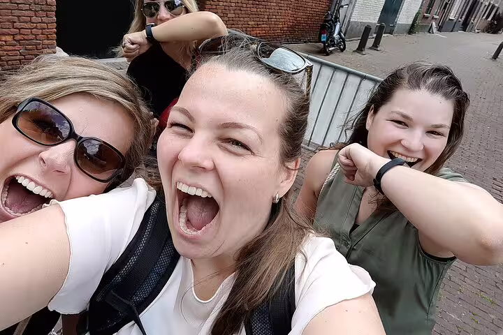Group selfie celebrating a clue solved on the Dublin e-scavenger hunt, a fun self-guided city tour game