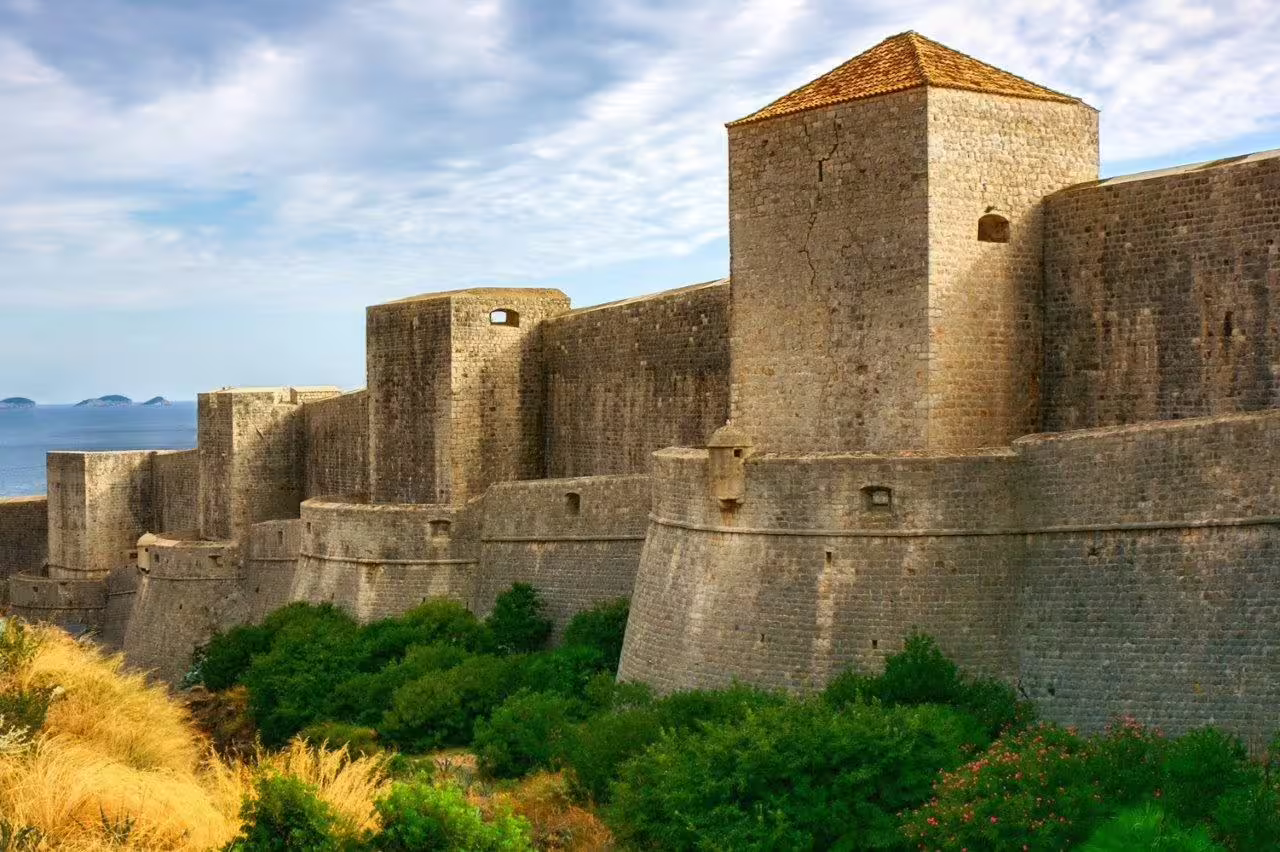 Dubrovnik city walls and stone fortress ramparts by the Adriatic, must-see on Dubrovnik and Split private tour
