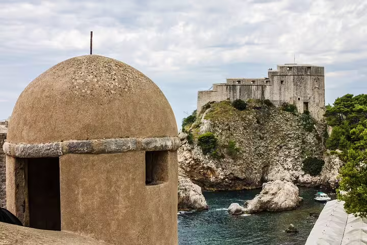 Dubrovnik city walls lookout with Fort Lovrijenac cliff views on a panoramic photo ride sightseeing tour