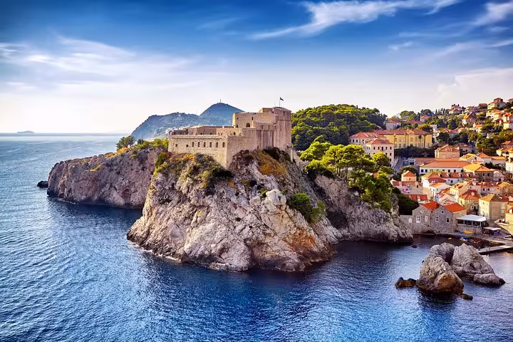 Dubrovnik city walls and Lovrijenac Fortress above the Adriatic, scenic stop on Zagreb to Dubrovnik tour