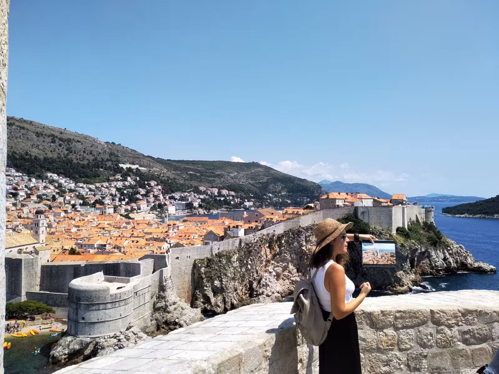 Guide at Dubrovnik city walls viewpoint over Old Town rooftops, Game of Thrones and history combo tour