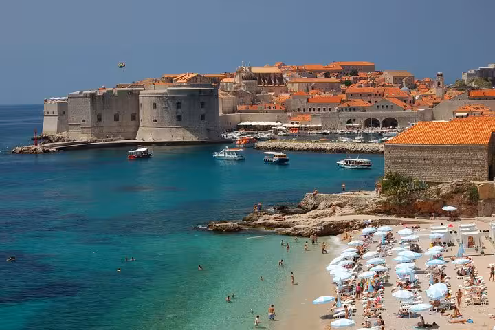 Dubrovnik harbor and Banje Beach with turquoise Adriatic water, ideal stop on a 7-day private Croatia tour