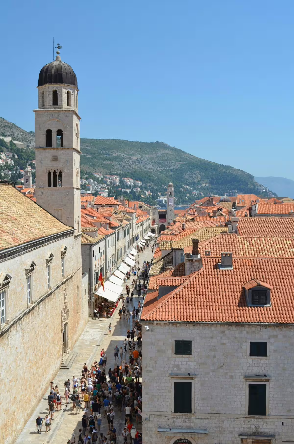 Stradun street and bell tower over Dubrovnik Old Town rooftops, panoramic view on a private Dubrovnik tour