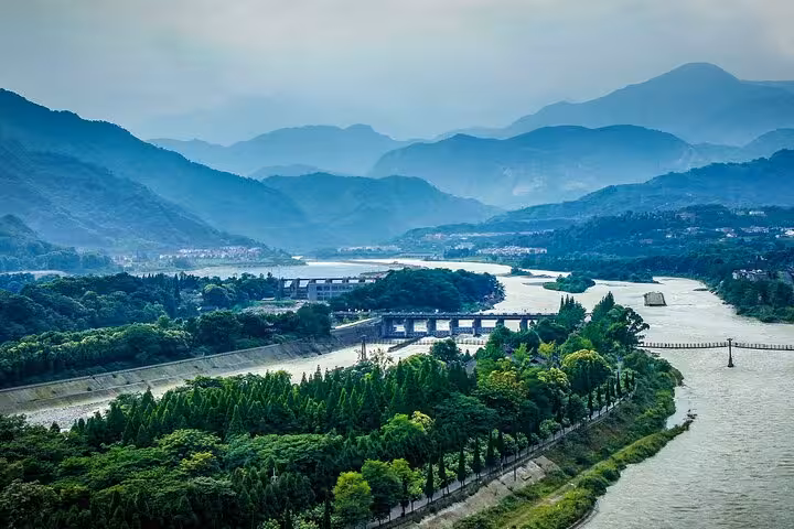 Scenic view of Dujiangyan's lush landscape and river system, perfect for a half-day tour in Sichuan, China.