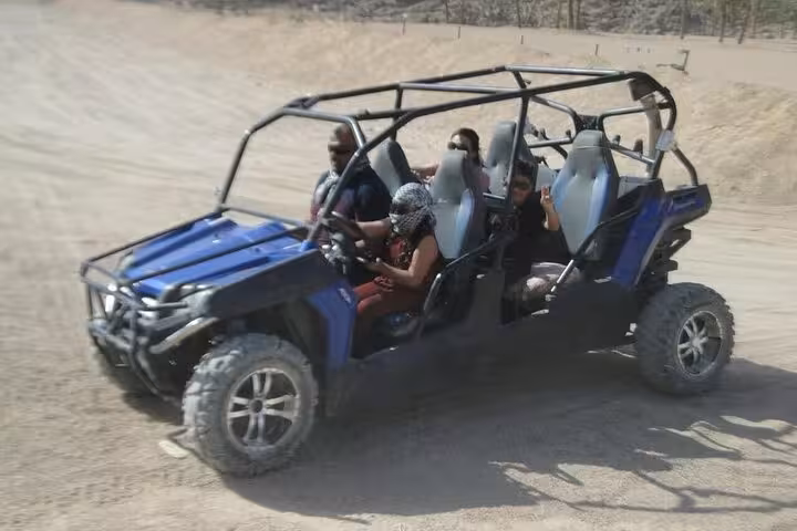 Dune buggy ride in Sharm El Sheikh desert with guests on off-road adventure tour in Sinai sands