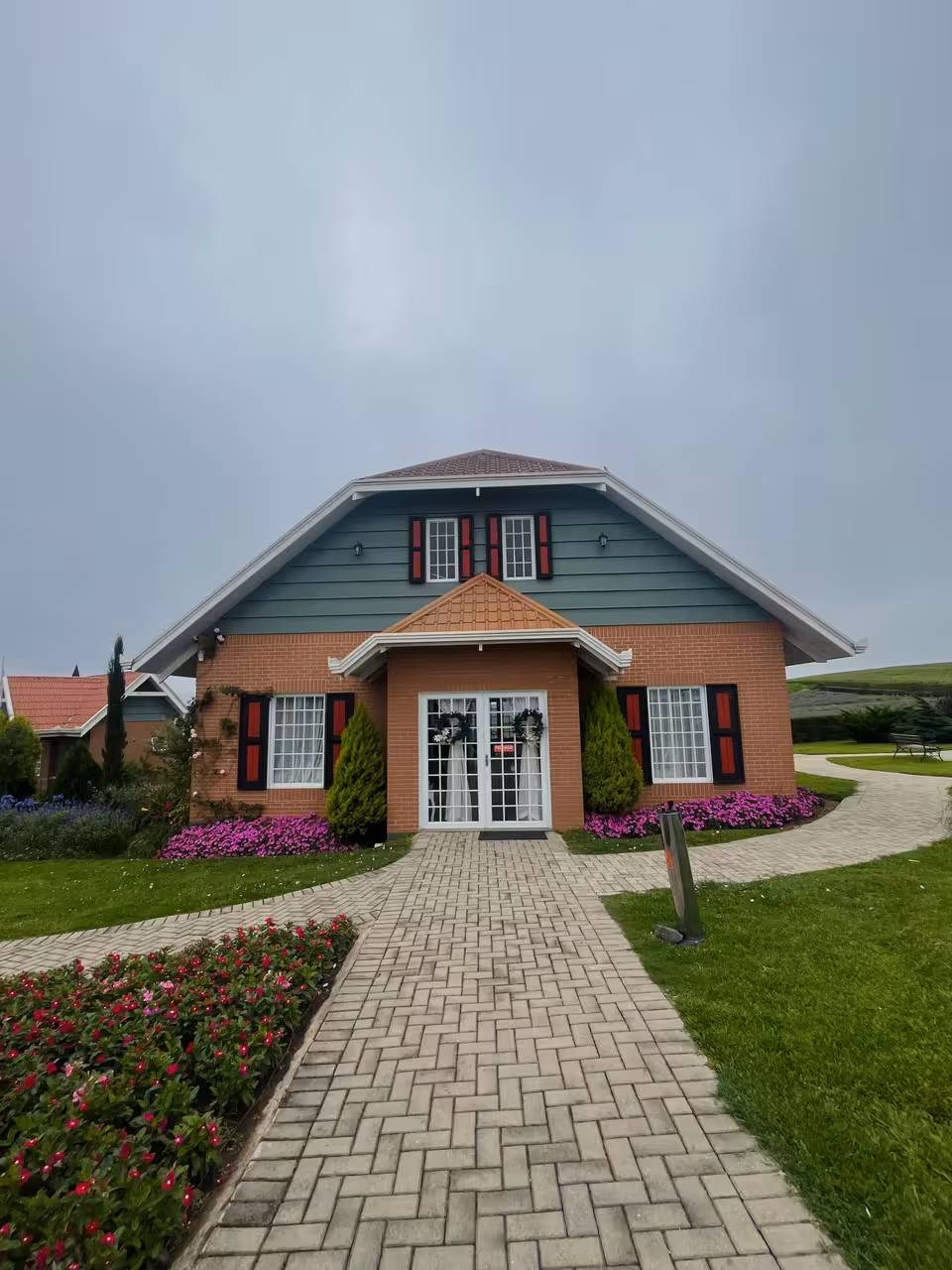 Charming Dutch-style house surrounded by vibrant gardens on the Dutch Colonies of Paraná 8-hour guided tour.