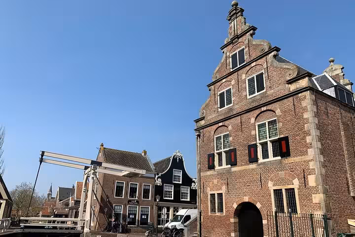 Historic Dutch gabled houses and drawbridge in a North Holland village on a private tour from Amsterdam