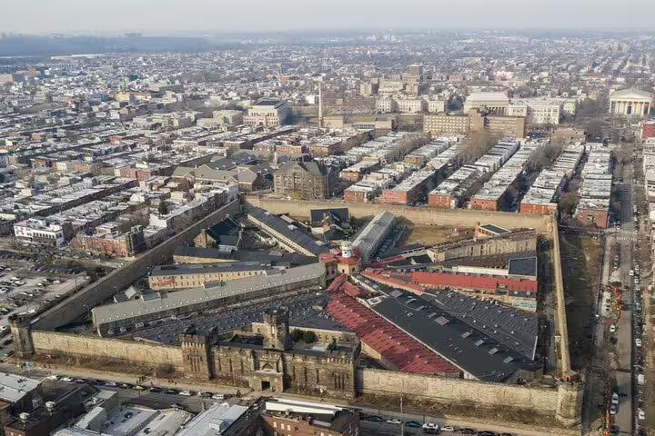 Aerial view of Eastern State Penitentiary surrounded by Philadelphia row homes and city streets