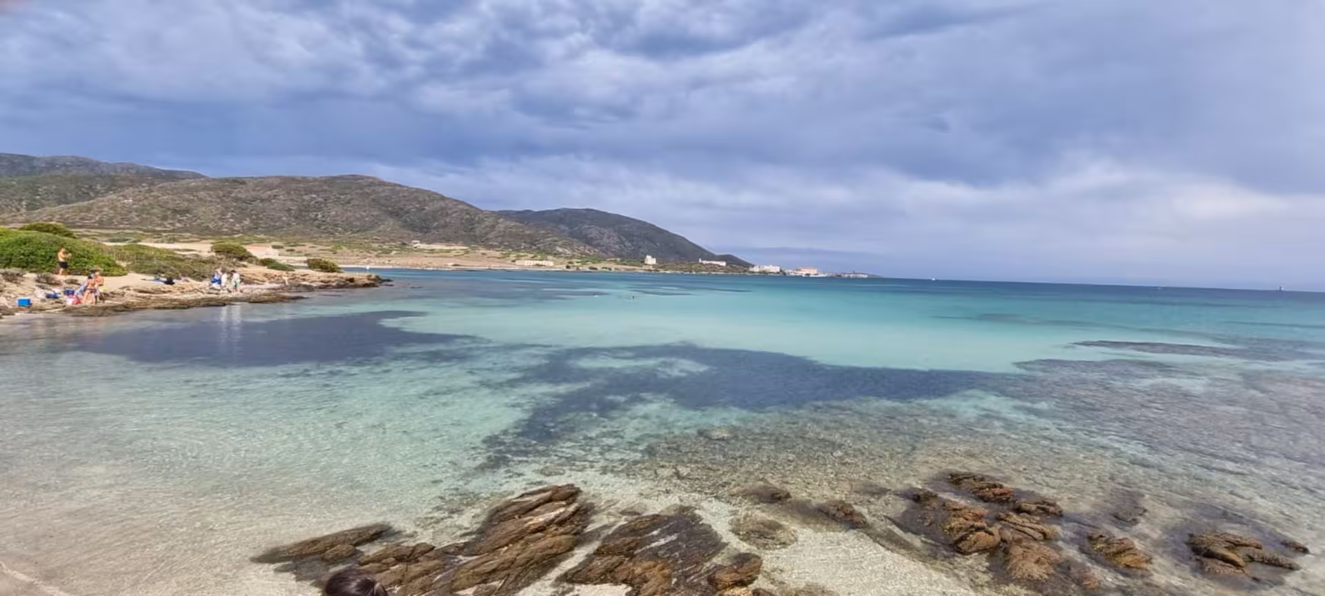 Explore Asinara's crystal-clear waters and scenic landscapes on an e-bike tour from Porto Torres.