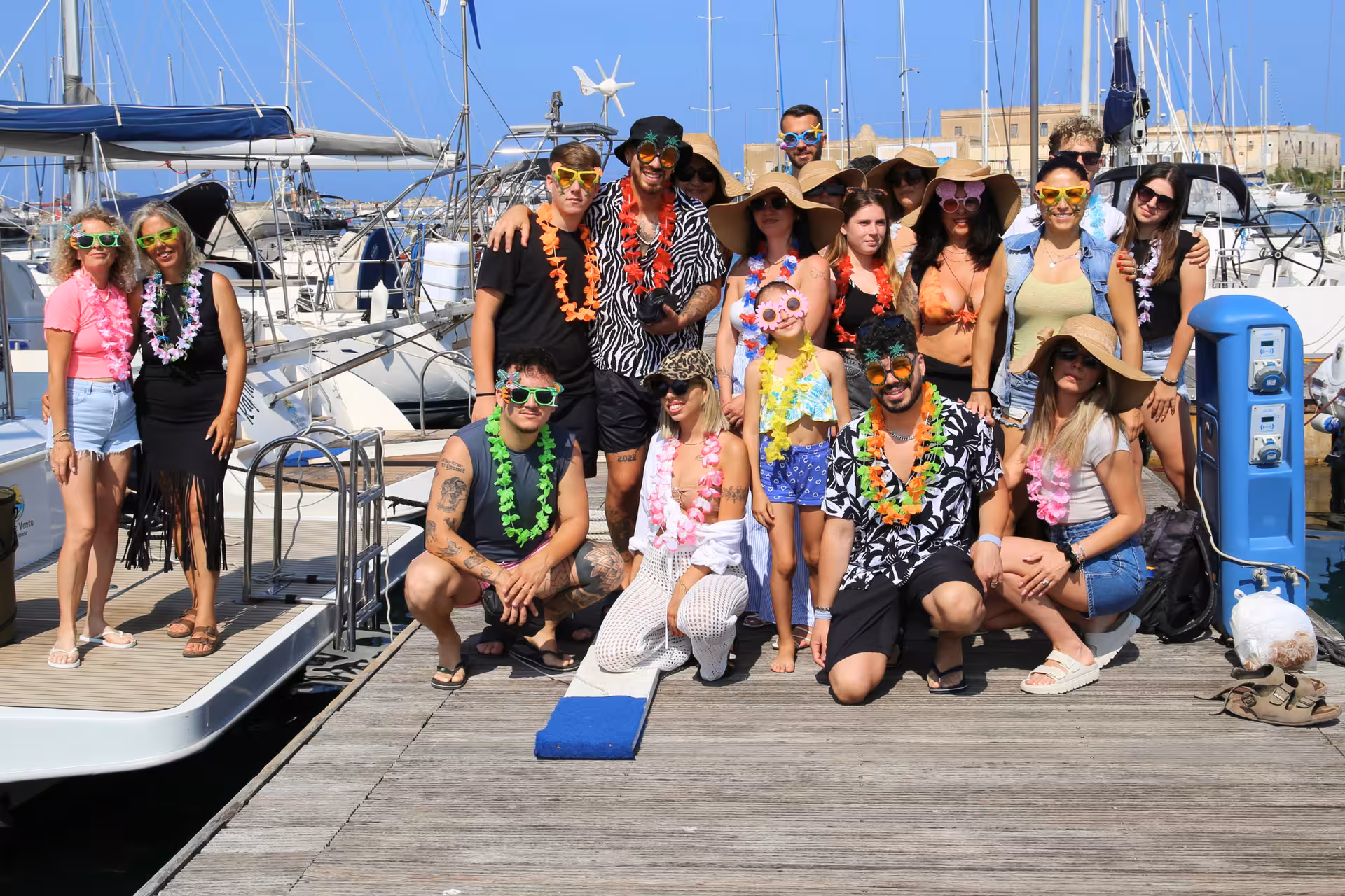 Group photo at Trapani marina before Egadi Islands private boat tour to Favignana and Levanzo with lunch