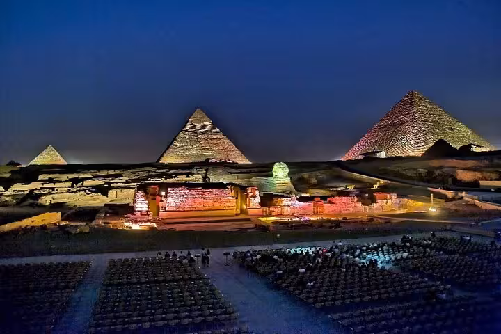 Evening sound and light show at the Pyramids of Giza during the 11-day all-inclusive Egypt tour with Nile cruise.