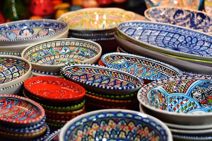 Colorful handmade Egyptian ceramic bowls at Sharm El-Sheikh Old Market bazaar stop on city tour