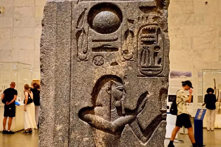 Ancient Egyptian carved stone stele with hieroglyphs at the Egyptian Museum during a private Cairo tour