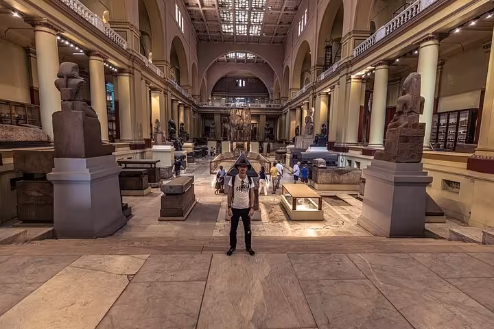 Main hall of the Egyptian Museum of Antiquities Cairo with statues, ideal for QR skip-the-line entry ticket