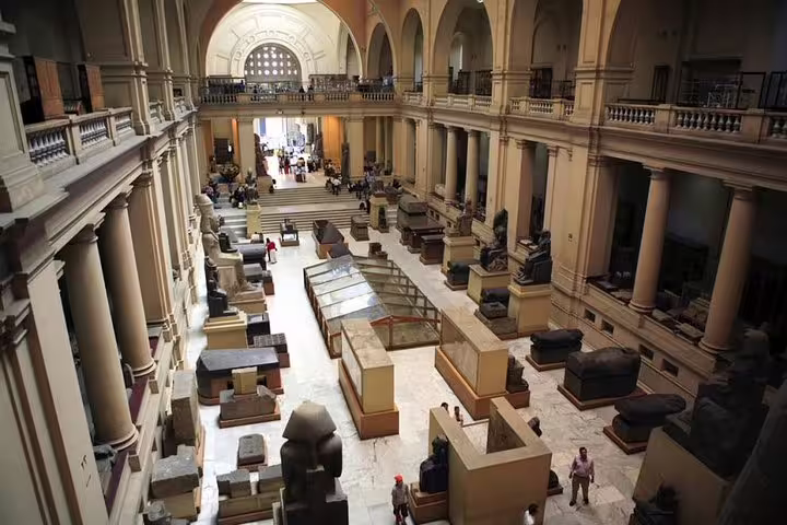 Grand hall of the Egyptian Museum Cairo with ancient artifacts, included in 9-day Egypt Cairo and Nile cruise