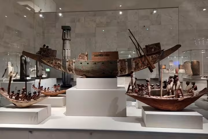 Ancient Egyptian boat models displayed at the Egyptian Museum Cairo, featured on a private guided Cairo tour