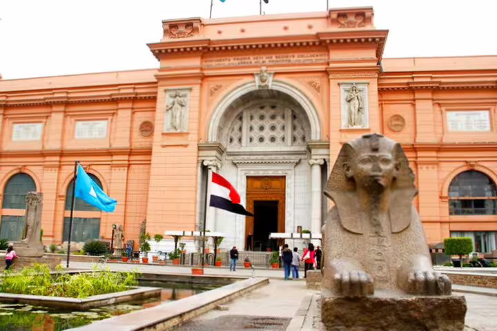 Egyptian Museum Cairo entrance with sphinx statue, highlight stop on Port Said 2-day Cairo and Alexandria tour