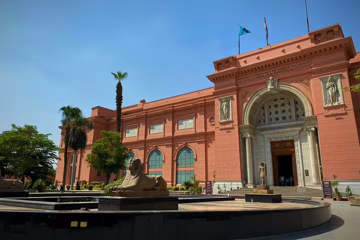 Exterior of the Egyptian Museum Cairo with sphinx statue, ideal stop on a private half-day guided tour