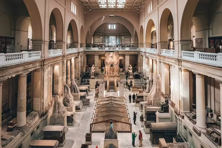 Grand hall inside the Egyptian Museum Cairo with statues and galleries, highlights on a private half-day guided tour