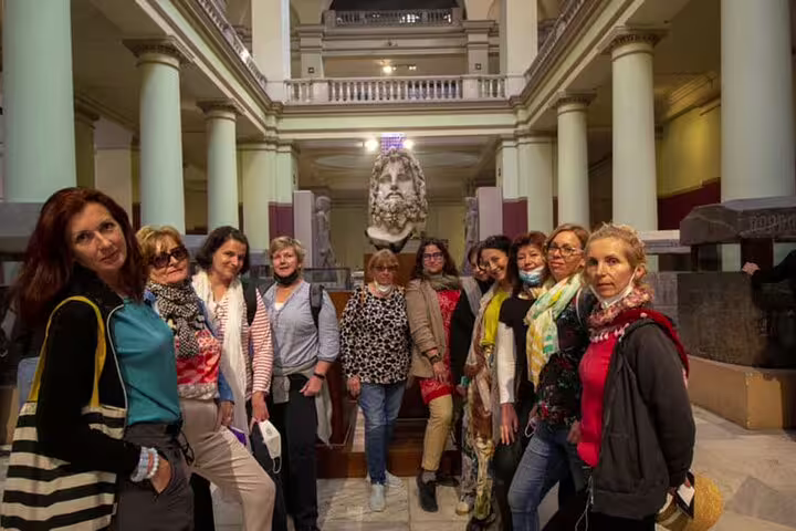Travel group inside the Egyptian Museum Cairo on a private 2-day Cairo tour including pyramids and Coptic Cairo