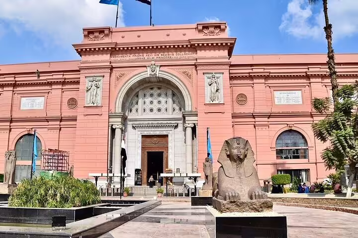 Egyptian Museum Cairo exterior with sphinx statue, included stop on Pyramids of Giza and Cairo day tour by plane