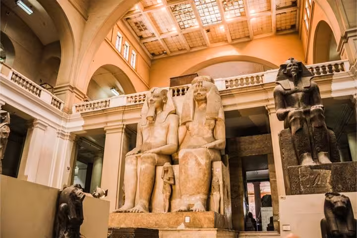 Colossal pharaoh statues inside Egyptian Museum Cairo on full-day tour from Hurghada to Cairo